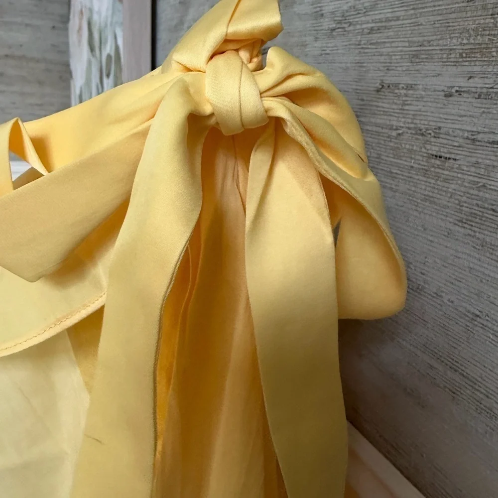 NWT new medium Anthropologie Maeve ruffle mini skirt yellow wrap tie